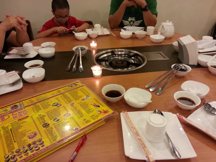 David's Tea House Banawe interior hotpot table setup with yellow menu